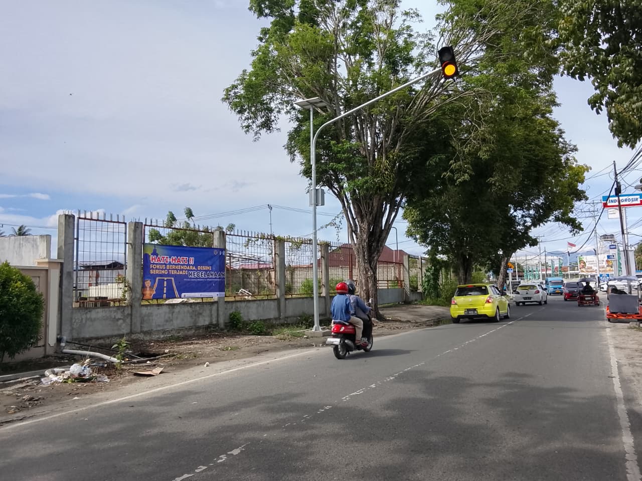 Jasa Raharja Cabang Gorontalo Edukasi Pengguna Jalan Lewat Pemasangan Spanduk Keselamatan
