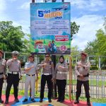 Jasa Raharja Cabang Gorontalo Bersama Kepolisian Pasang Spanduk Keselamatan di Kwandang